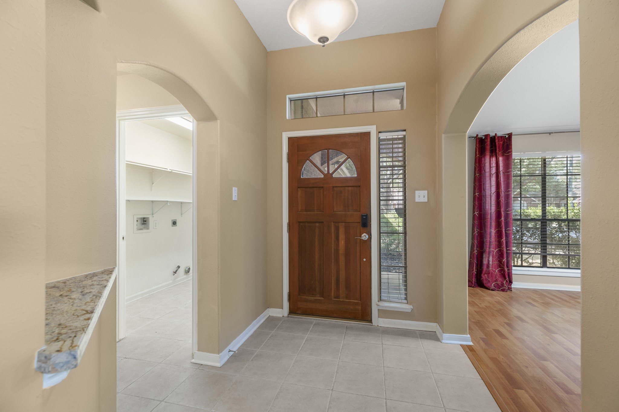 9109 Benwick Street Spring, TX 77379 - Photo 4 of 28 wooden floor and window in a room