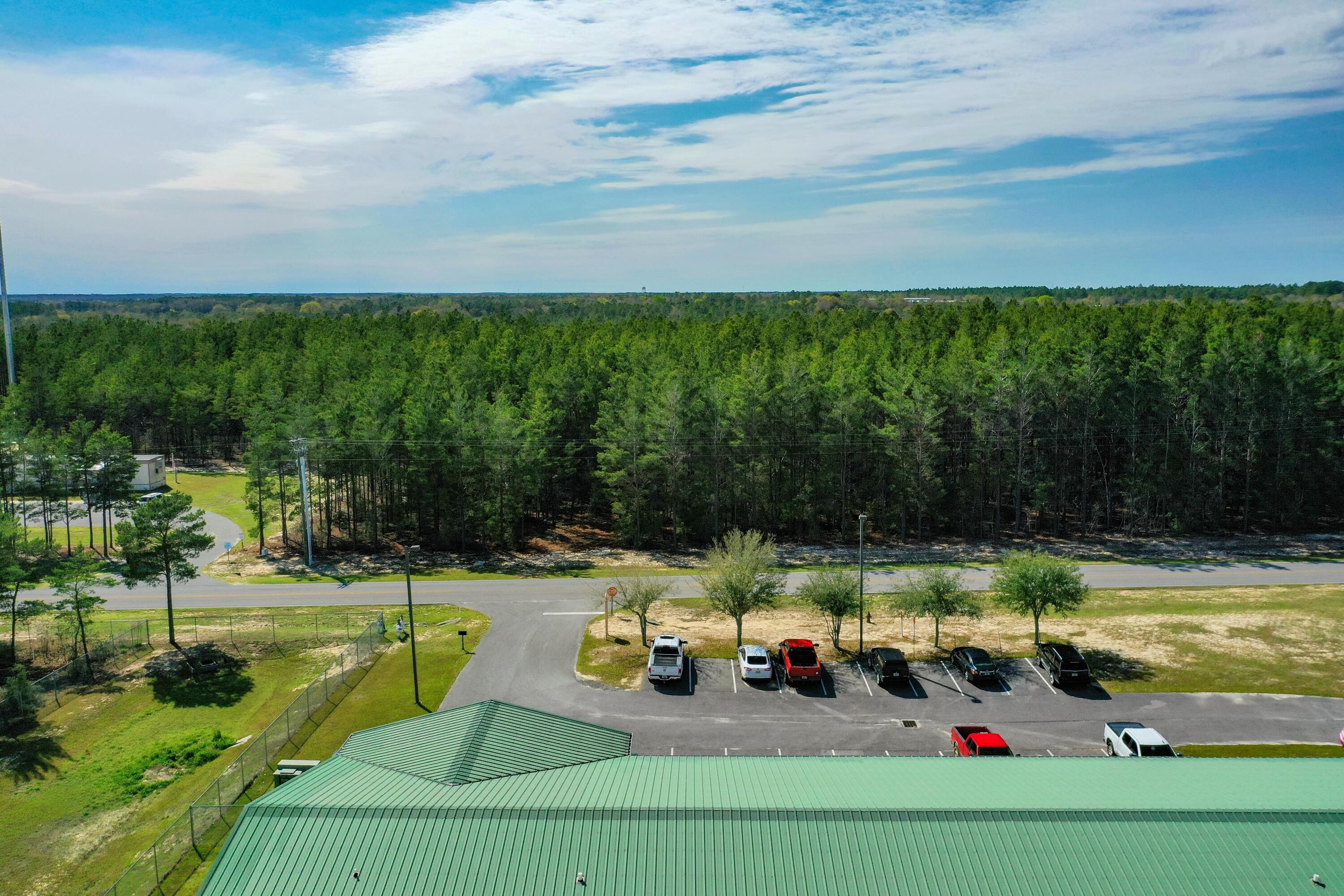 Xxx Triple G Road DeFuniak Springs, FL 32433 - Photo 11 of 16 a view of a swimming pool with a yard