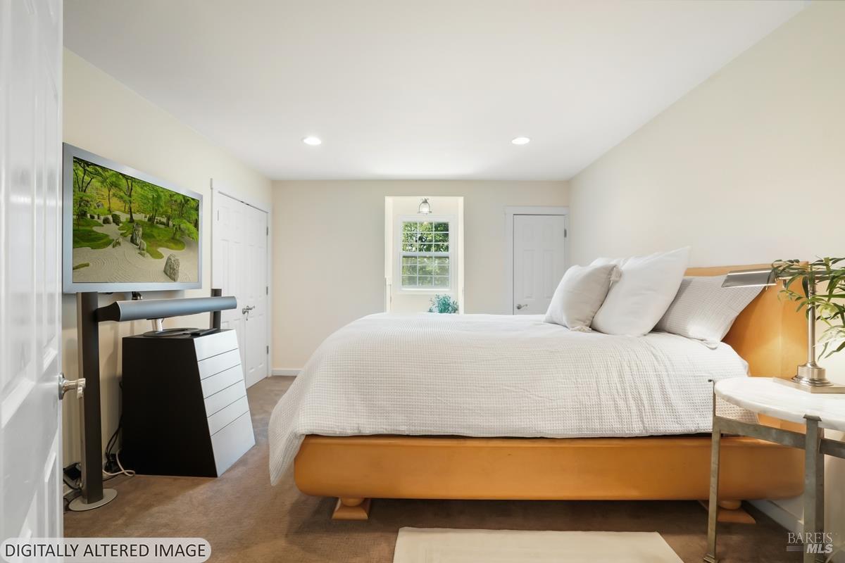 1846 Indian Valley Road, Unit A Novato, CA 94947 - Photo 34 of 45 a bedroom with a bed and a large window
