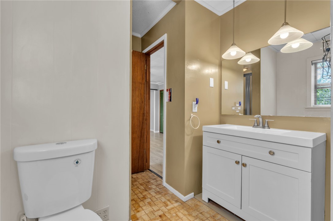 466 Whetstone Road Mountain Rest, SC 29664 - Photo 20 of 31 This bright bathroom features a modern vanity and a functional toilet.