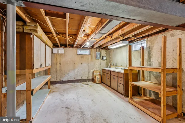 a view of a room with wooden walls