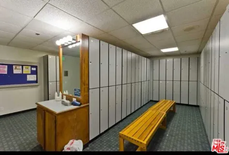 a view of a room with kitchen island