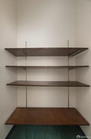 a view of a room with a hallway