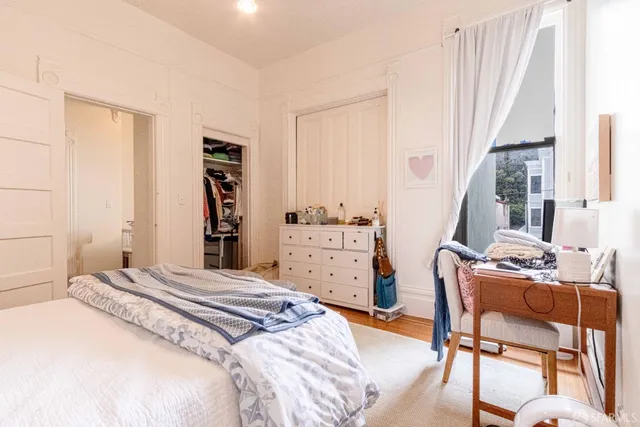 a kitchen with stainless steel appliances a stove a sink and a refrigerator
