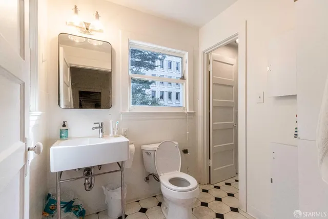 a view of a building with sitting area