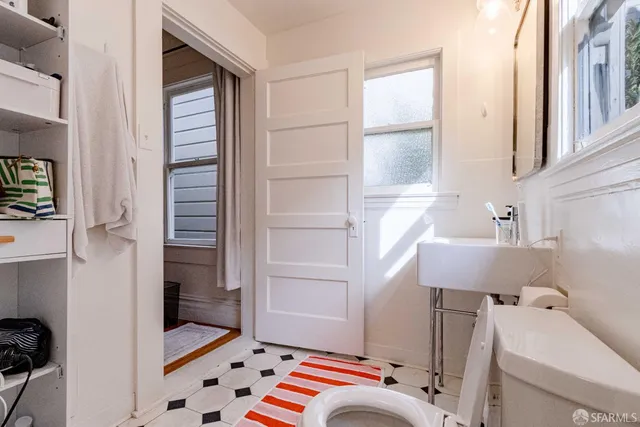 a view of a chairs and table in a patio