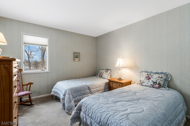 855 Sunset Ridge Bridgewater, NJ 08807 - Photo 27 of 39 a bedroom with two beds and a window