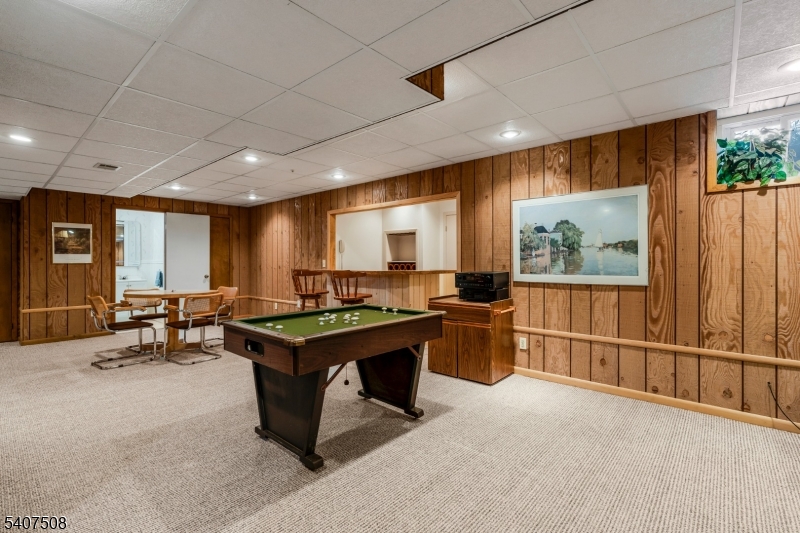 855 Sunset Ridge Bridgewater, NJ 08807 - Photo 31 of 39 a room with lots of furniture and a large window