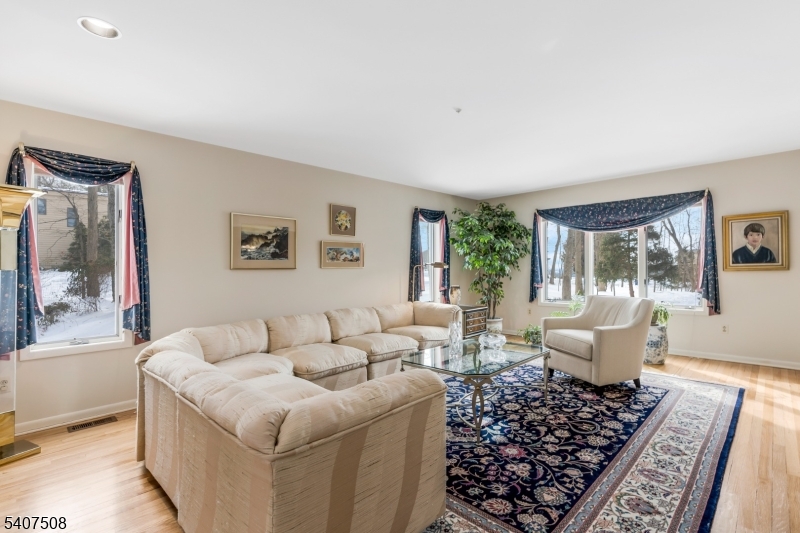 855 Sunset Ridge Bridgewater, NJ 08807 - Photo 9 of 39 a living room with furniture and a window