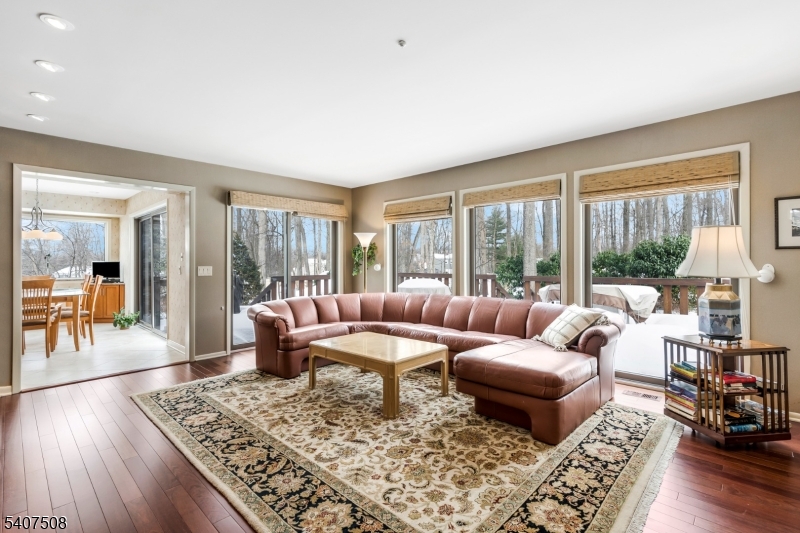 855 Sunset Ridge Bridgewater, NJ 08807 - Photo 10 of 39 a living room with furniture and a wooden floor