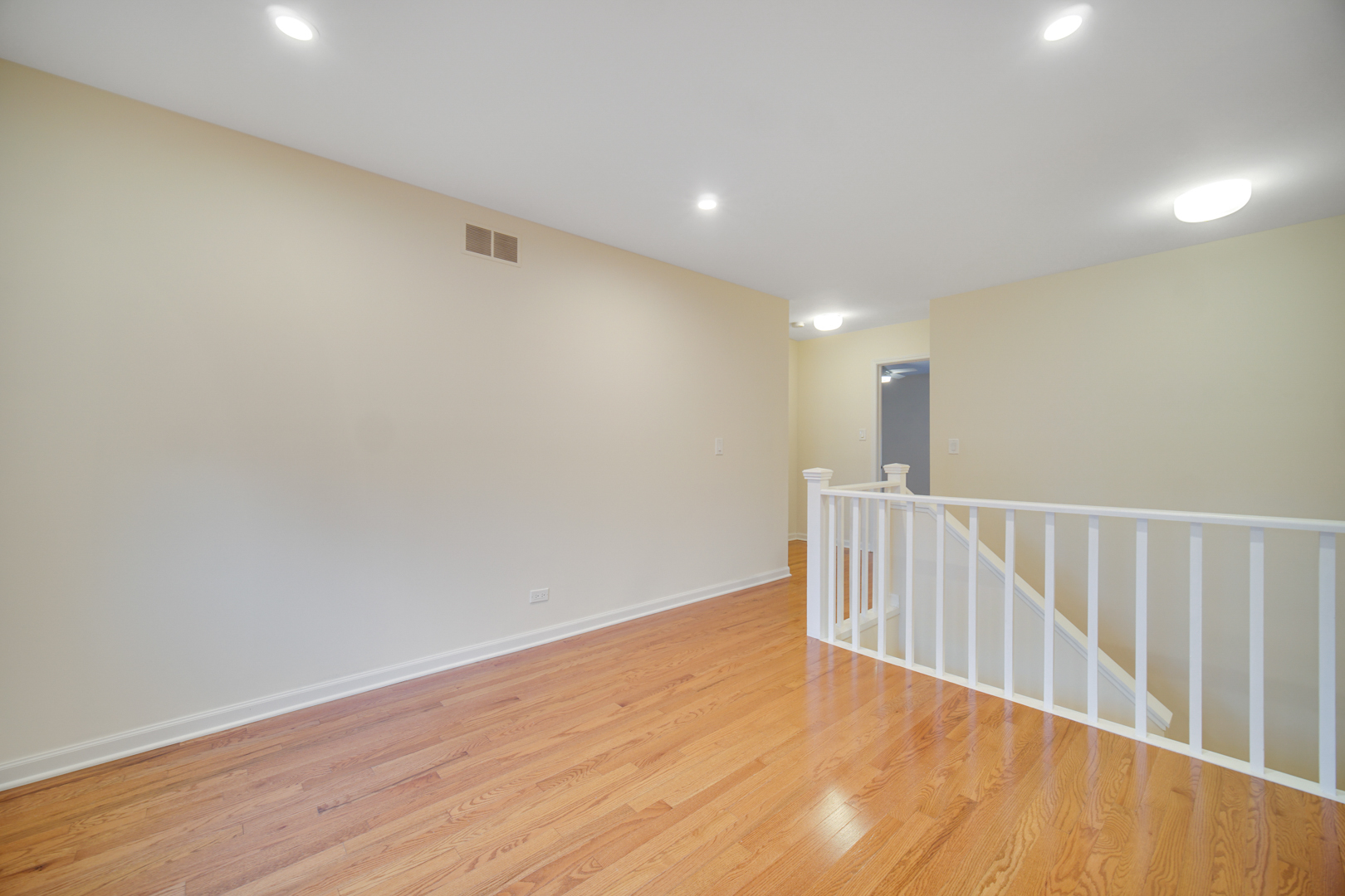 1130 Oakview Drive Wheaton, IL 60187 - Photo 15 of 25 a view of hallway with wooden floor