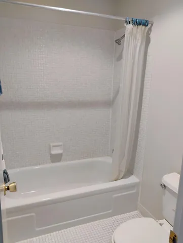 a bathroom with a sink vanity and mirror