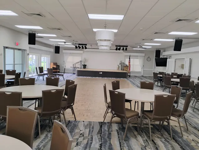 a kitchen with granite countertop a sink and a stove
