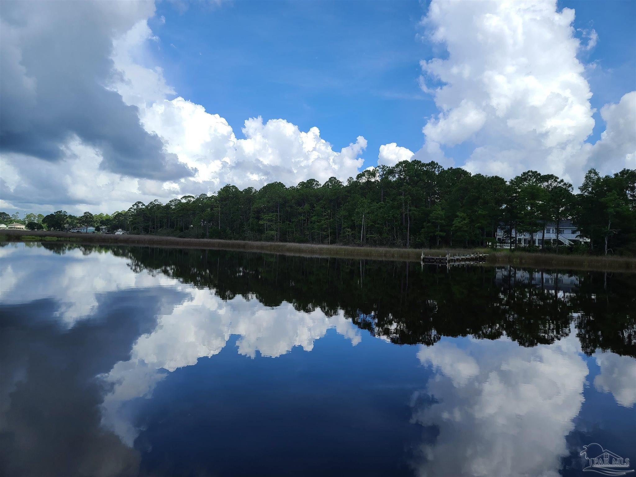 8855 Gerald Road Pensacola, FL 32507 - Photo 31 of 33 a view of a lake from a yard