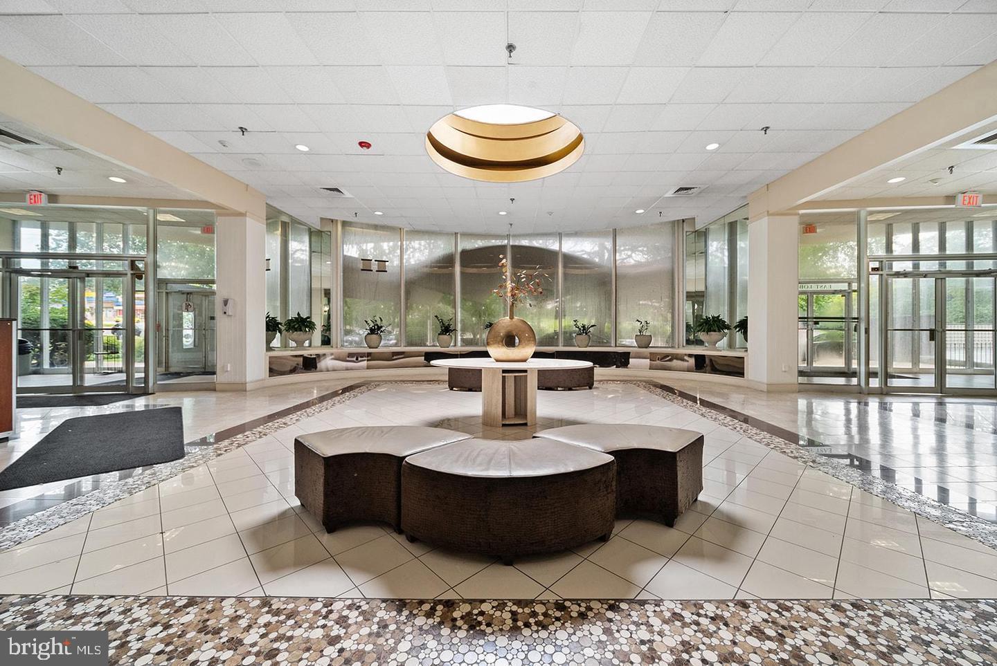 3900-00 West Ford Road, Unit 14K Philadelphia, PA 19131 - Photo 19 of 42 Elegant lobby with modern design elements.