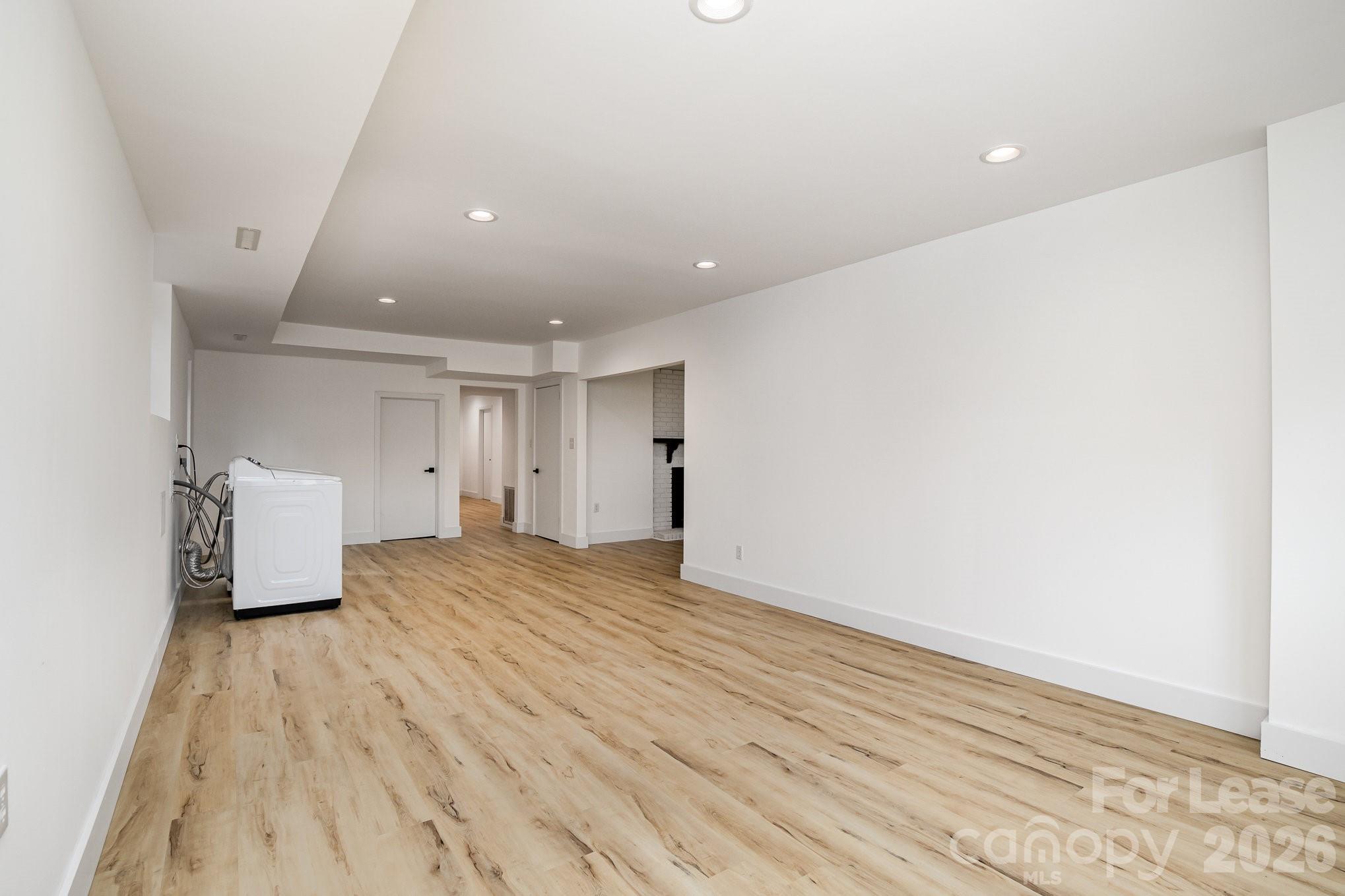 7407 Forney Hill Road Denver, NC 28037 - Photo 9 of 10 a view of empty room with wooden floor