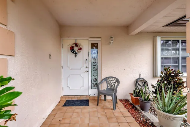a front view of a house with patio