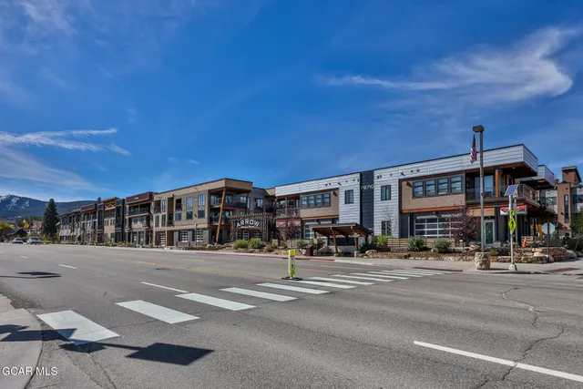 a front view of building with street