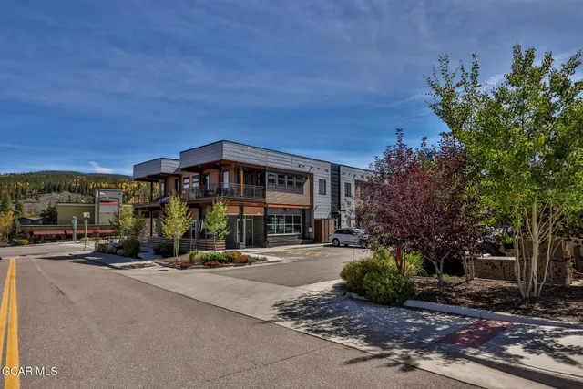 a front view of a building with street view
