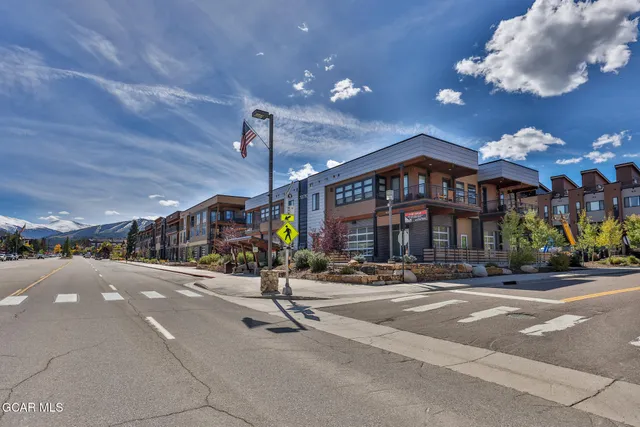 a view of a building with a street