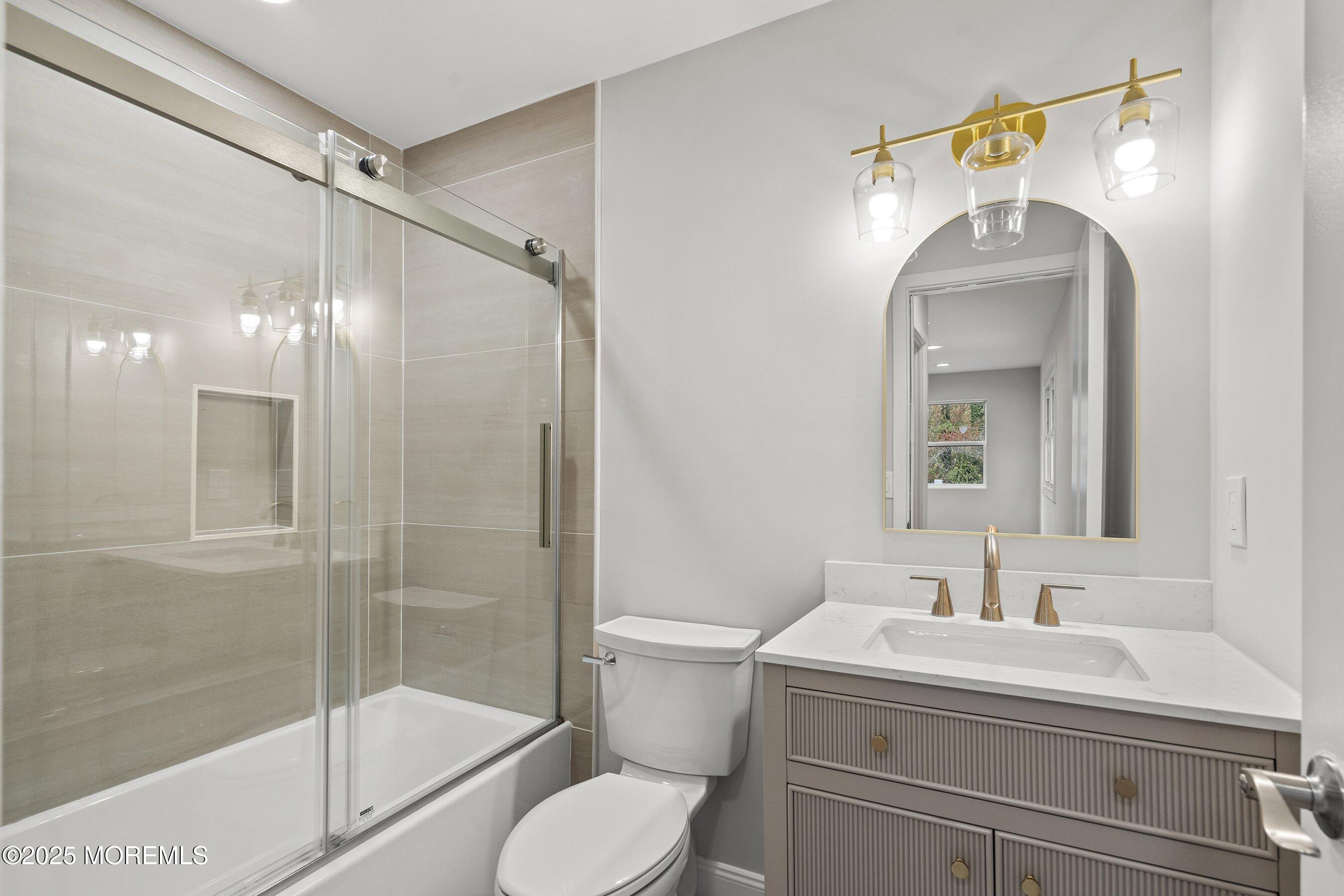 122 West 6th Street Howell, NJ 07731 - Photo 20 of 20 a bathroom with a sink toilet and shower