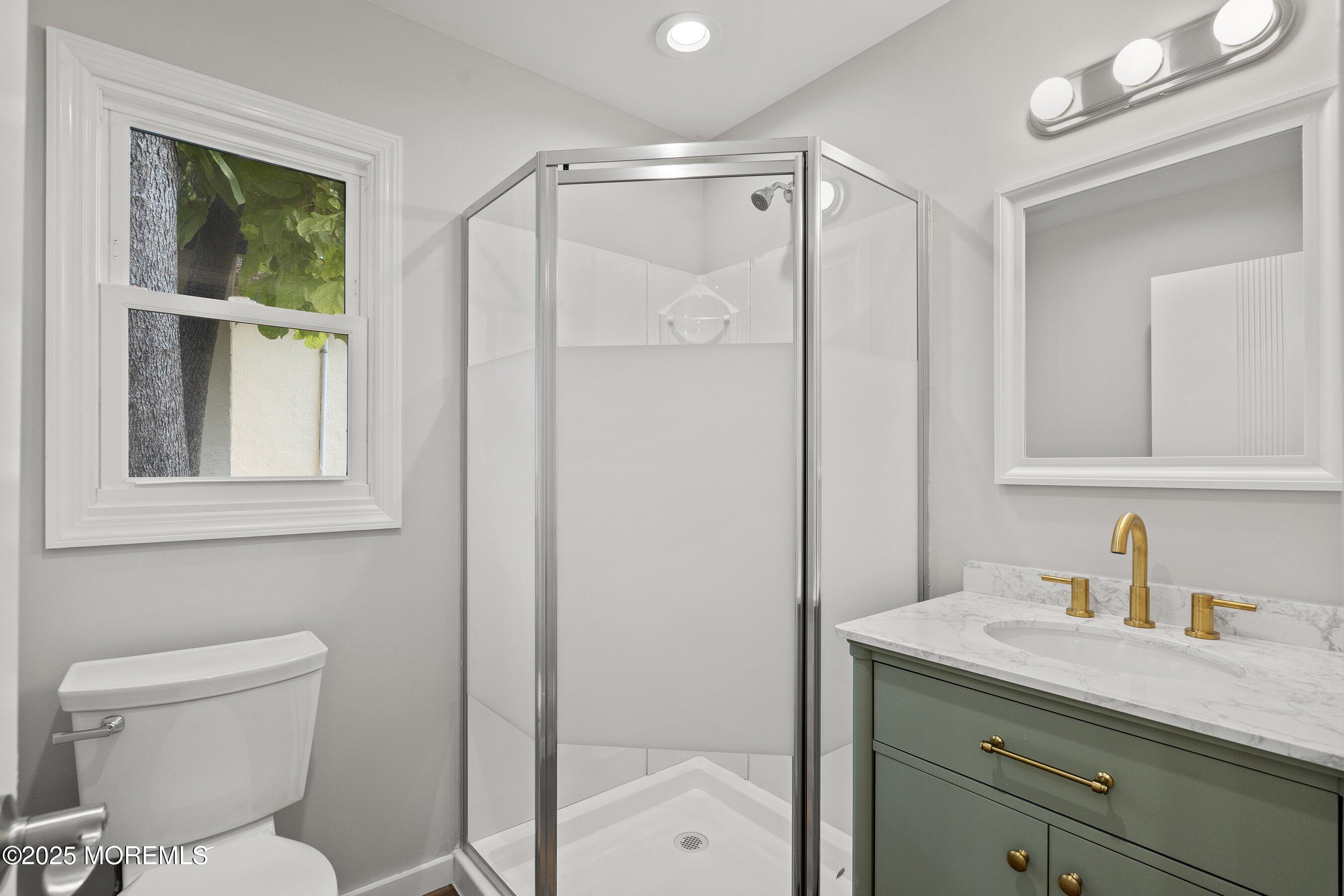 122 West 6th Street Howell, NJ 07731 - Photo 7 of 20 a bathroom with a granite countertop sink toilet and shower