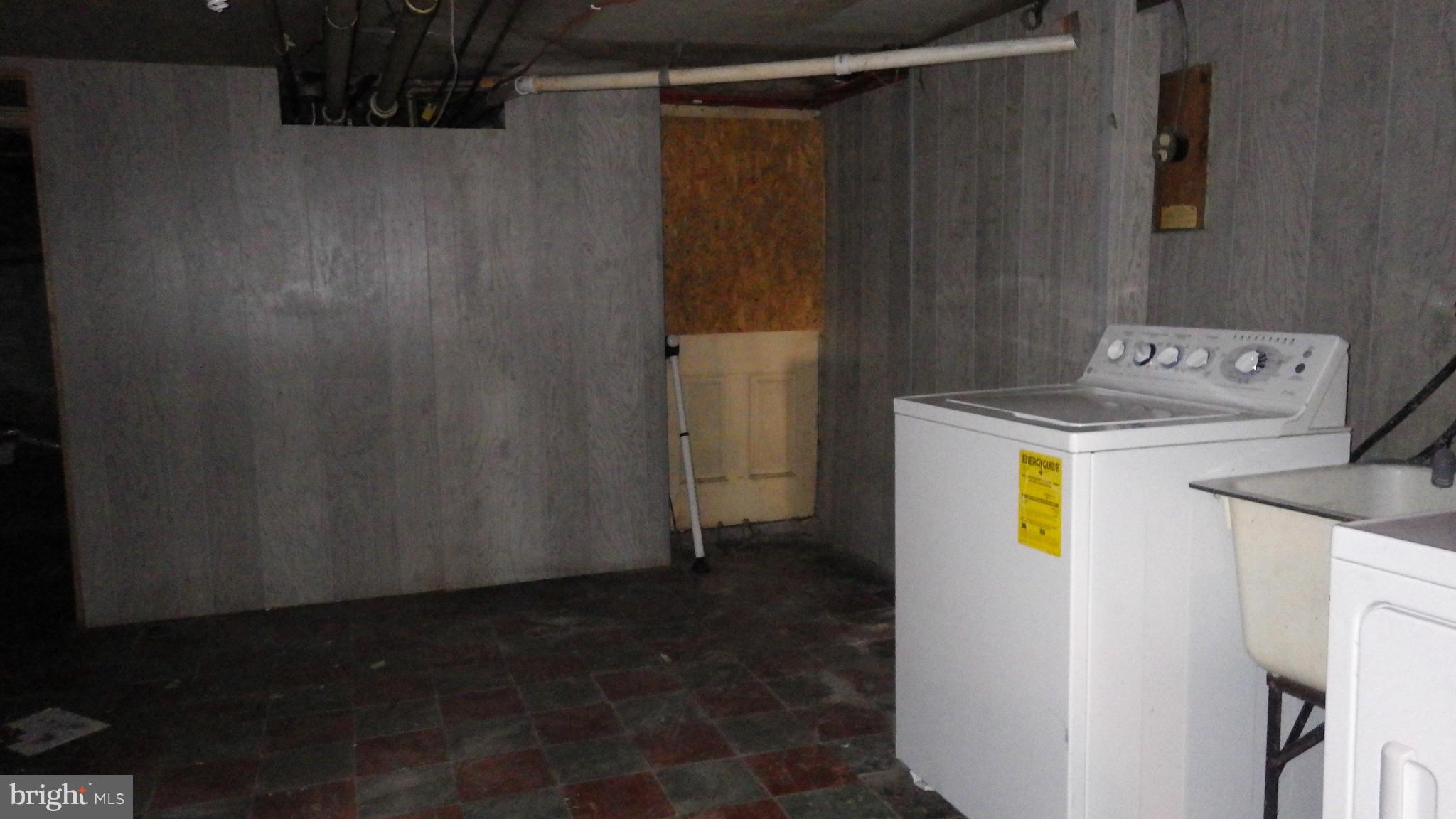 6055 Harford Road Baltimore, MD 21214 - Photo 13 of 13 a utility room with dryer and washer