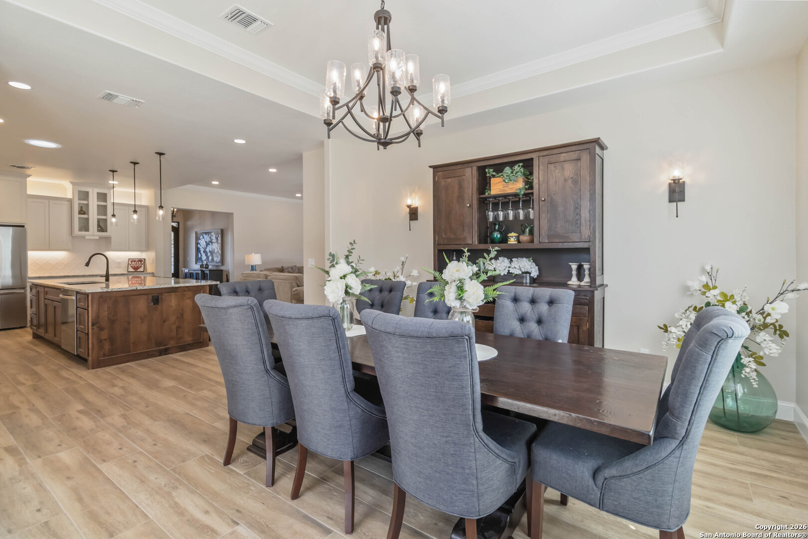 43 Lost Valley Boerne, TX 78006 - Photo 16 of 61 a view of a dining room with furniture and chandelier