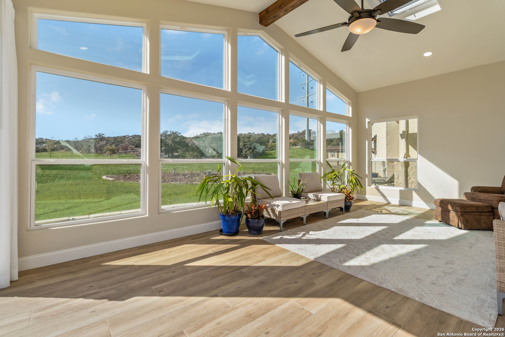43 Lost Valley Boerne, TX 78006 - Photo 21 of 61 a living room with hardwood floor and a large window