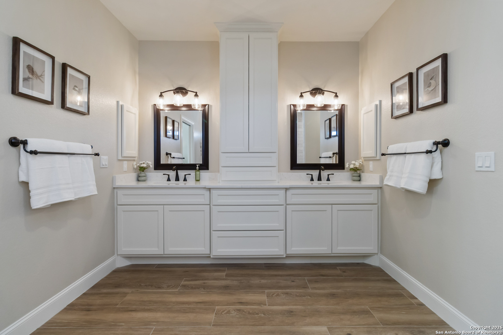 43 Lost Valley Boerne, TX 78006 - Photo 25 of 61 a bathroom with a double vanity sink a mirror and a