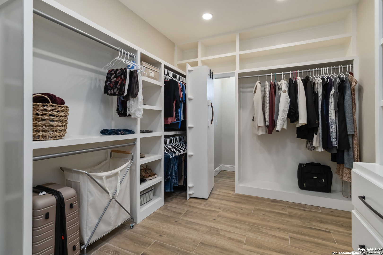 43 Lost Valley Boerne, TX 78006 - Photo 27 of 61 a view of walk in closet with clothes and shoes