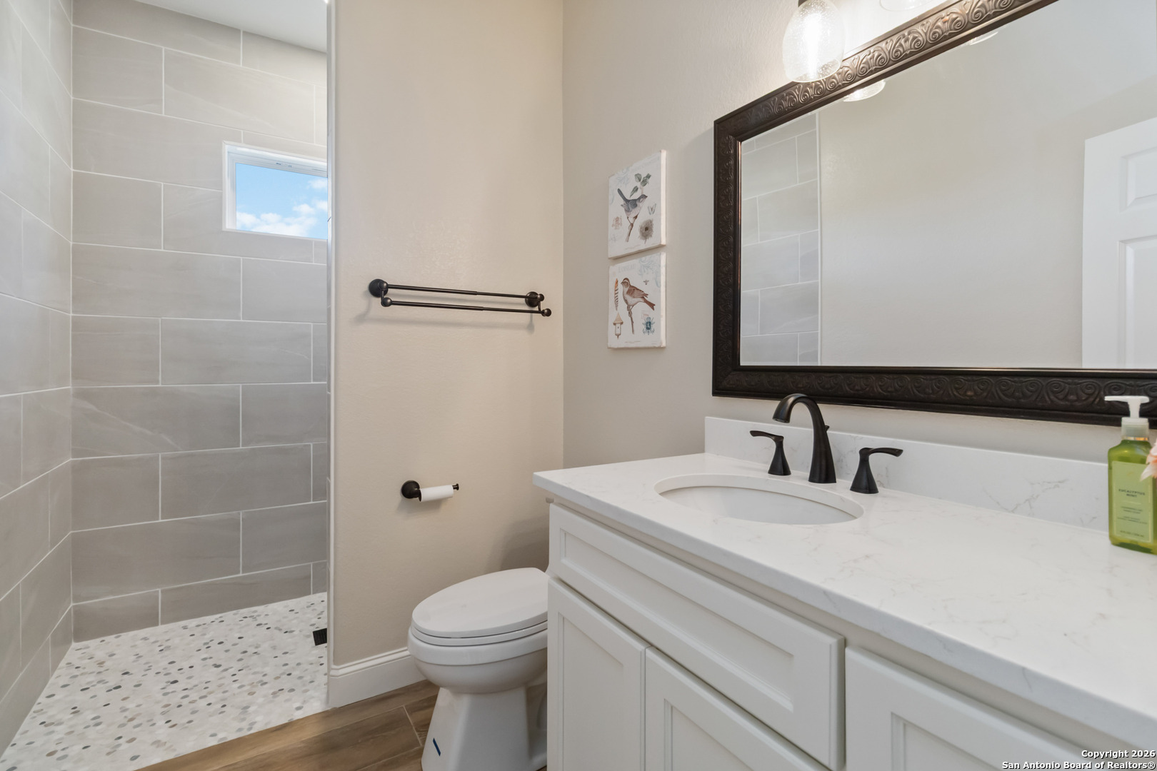 43 Lost Valley Boerne, TX 78006 - Photo 32 of 61 a bathroom with a sink a toilet and shower