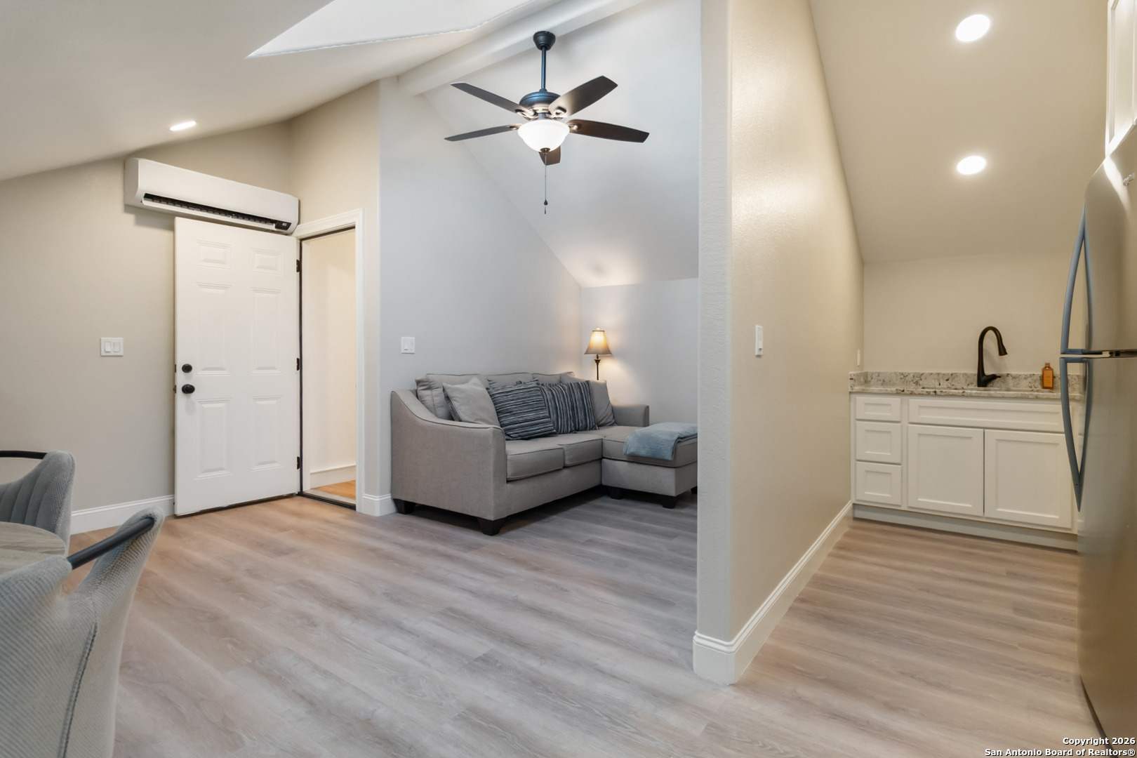 43 Lost Valley Boerne, TX 78006 - Photo 36 of 61 a living room with furniture and a wooden floor