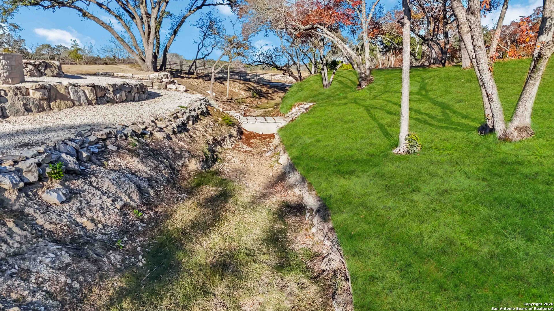 43 Lost Valley Boerne, TX 78006 - Photo 50 of 61 a backyard of a building with large trees