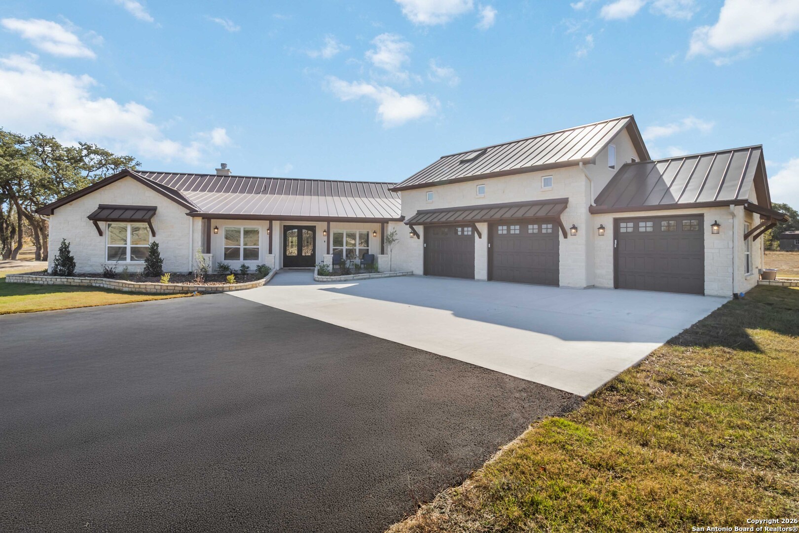 43 Lost Valley Boerne, TX 78006 - Photo 61 of 61 a front view of a house with a yard and table and chairs