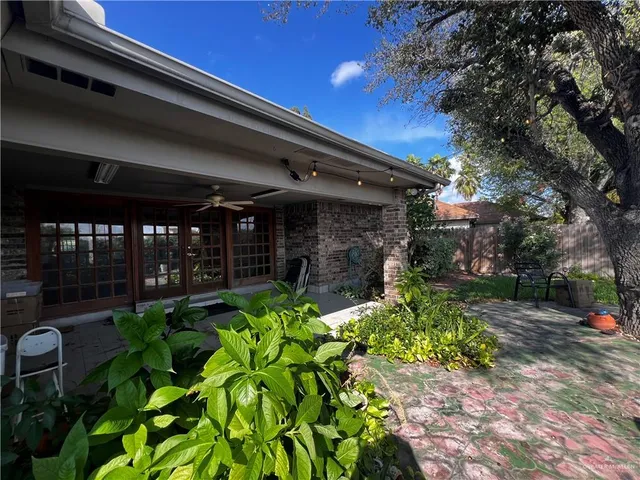 a view of a back yard of the house