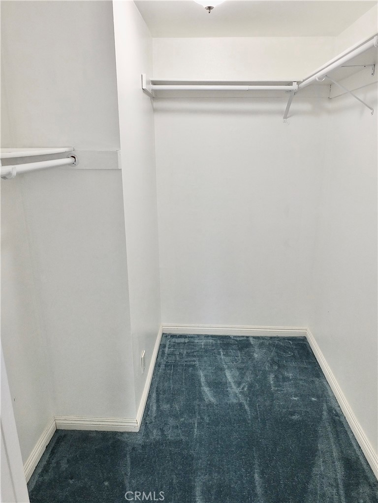 4591 Orange Avenue, Unit 306 Long Beach, CA 90807 - Photo 22 of 34 a view of a room with shelf
