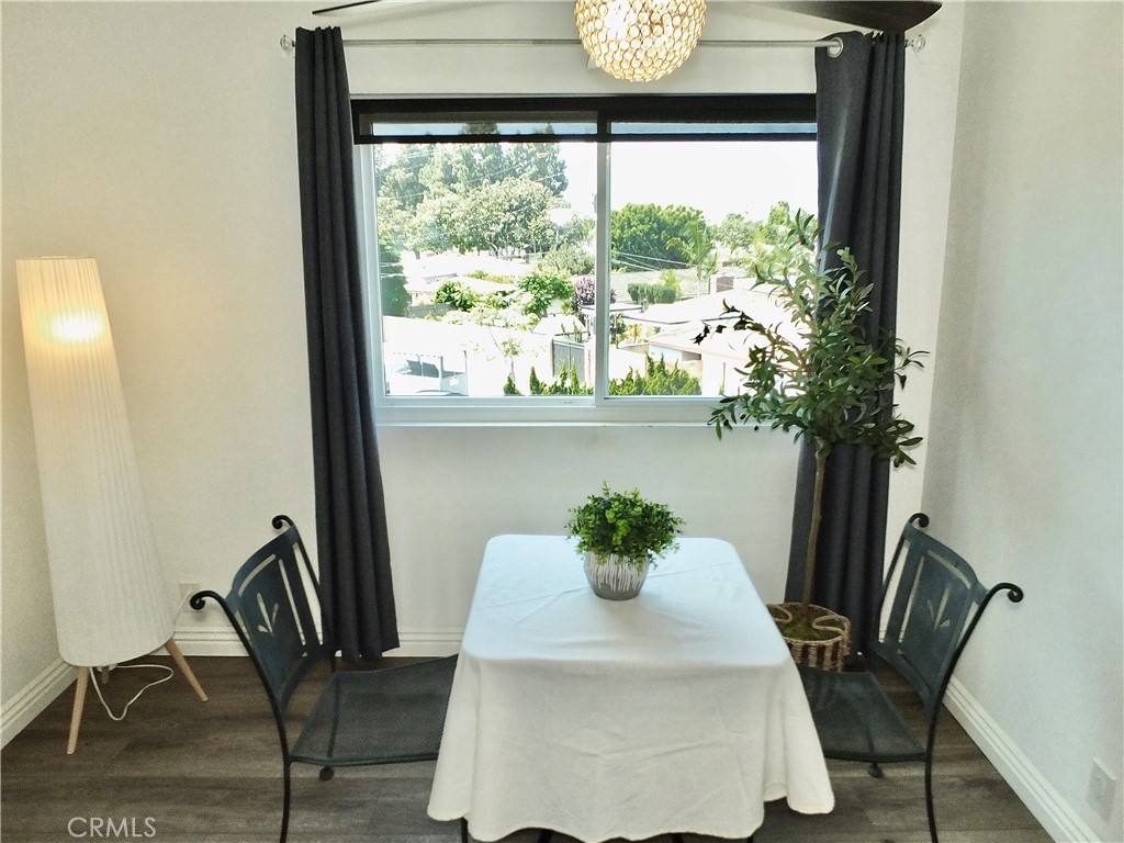 4591 Orange Avenue, Unit 306 Long Beach, CA 90807 - Photo 3 of 34 a dining room with furniture and window