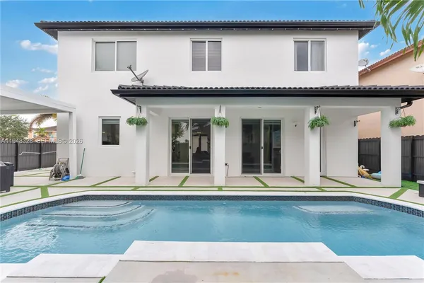 a front view of a house with lots of outdoor space