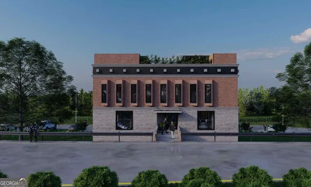 a car parked in front of a house with a yard