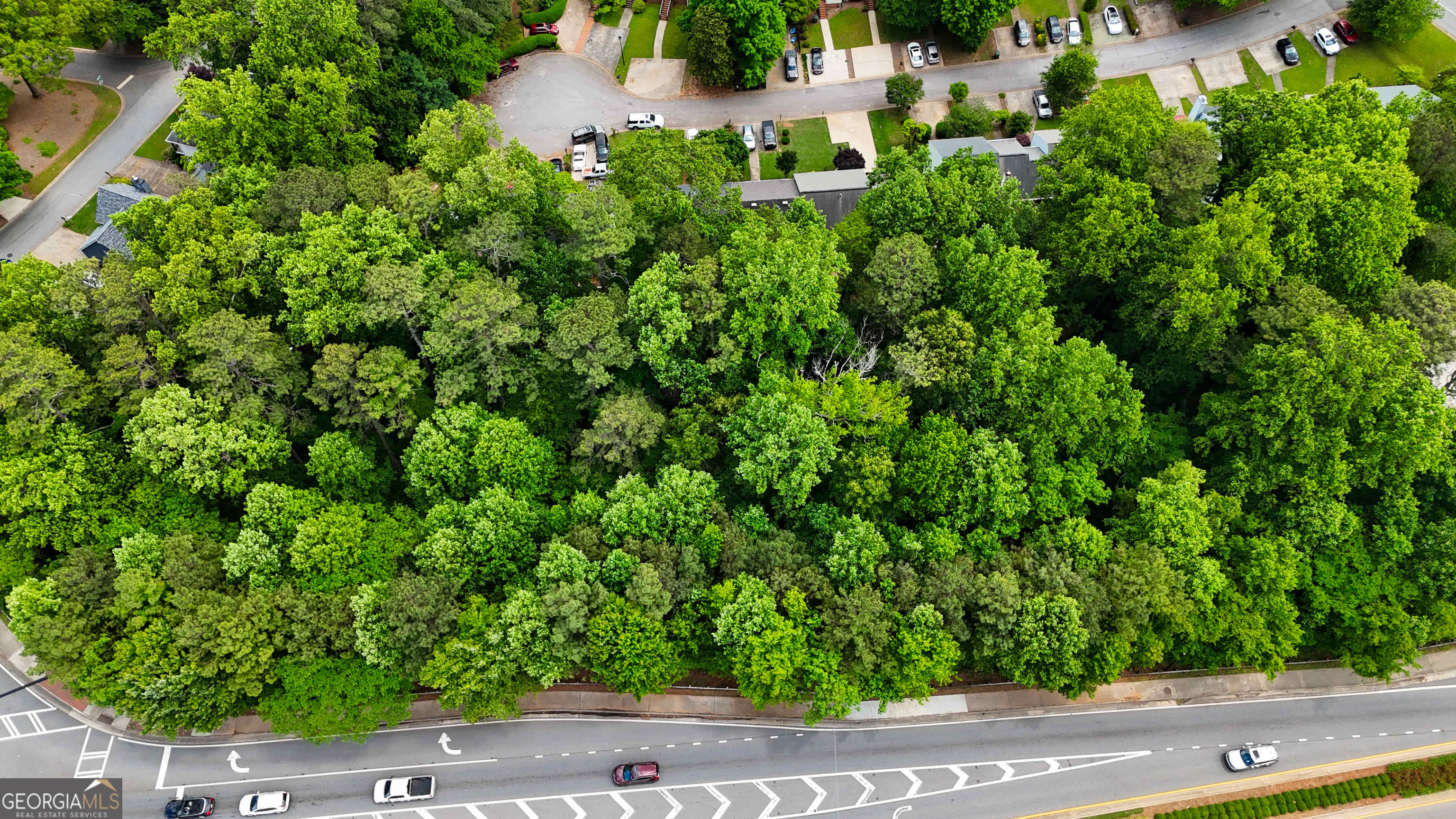 1141 Whitlock Avenue Southwest Marietta, GA 30064 - Photo 7 of 22 an aerial view of a house with a yard