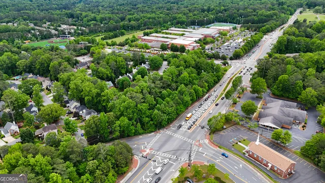 an aerial view of a house with a garden
