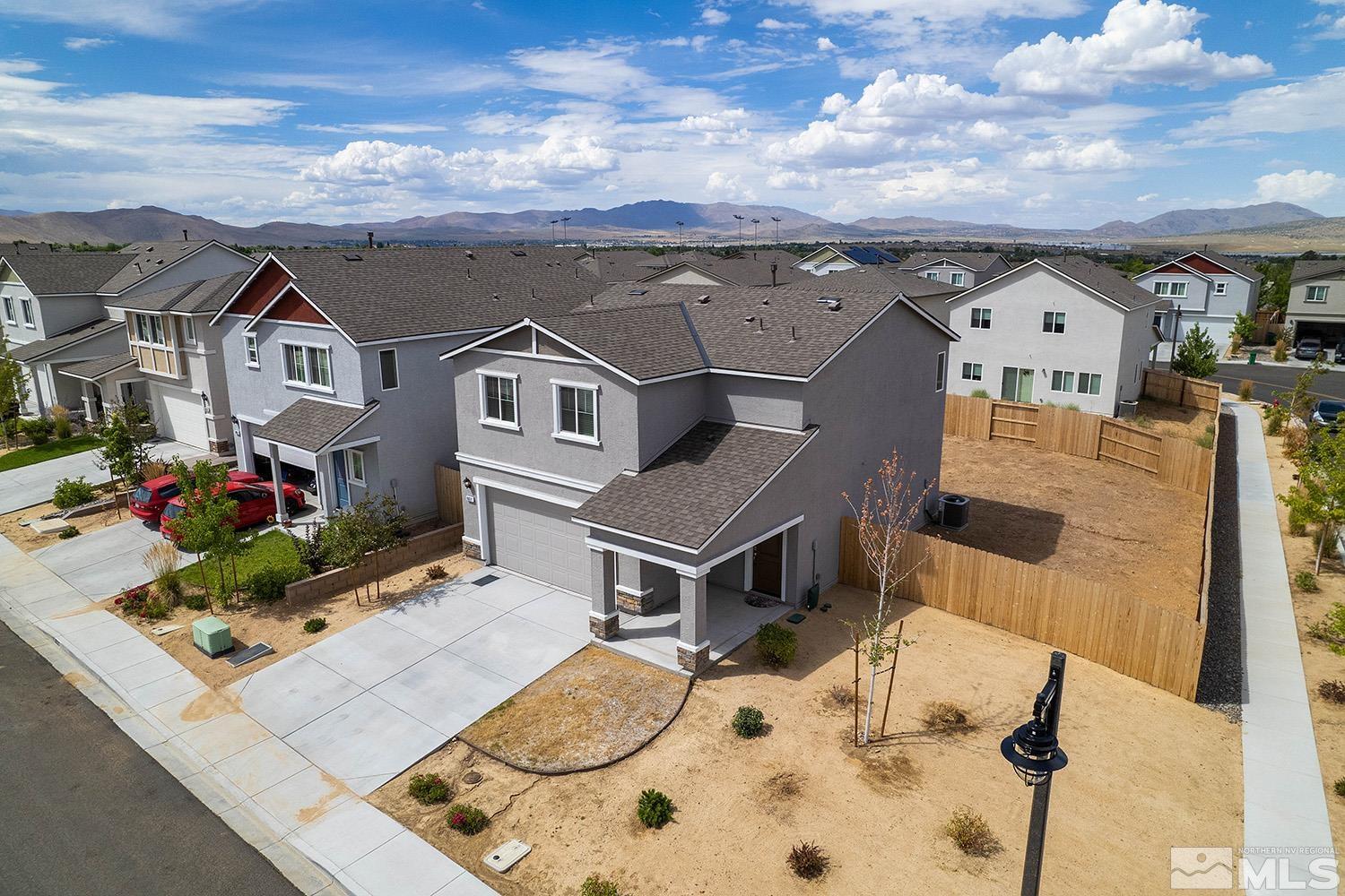 8831 Gazing Star Drive Reno, NV 89506 - Photo 2 of 27 an aerial view of a house with a balcony