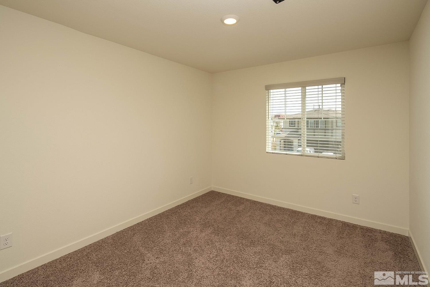 8831 Gazing Star Drive Reno, NV 89506 - Photo 22 of 27 an empty room with a window