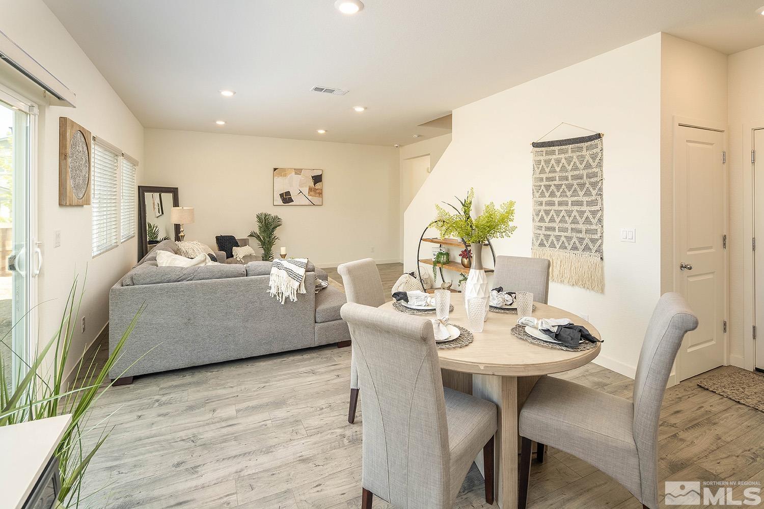 8831 Gazing Star Drive Reno, NV 89506 - Photo 6 of 27 a living room with furniture and a table