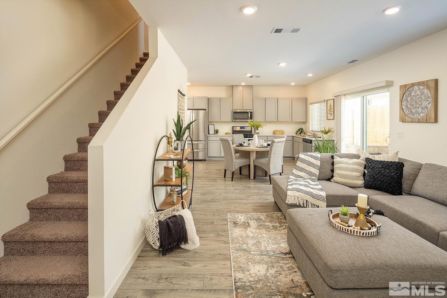 8831 Gazing Star Drive Reno, NV 89506 - Photo 10 of 27 a living room with furniture and wooden floor