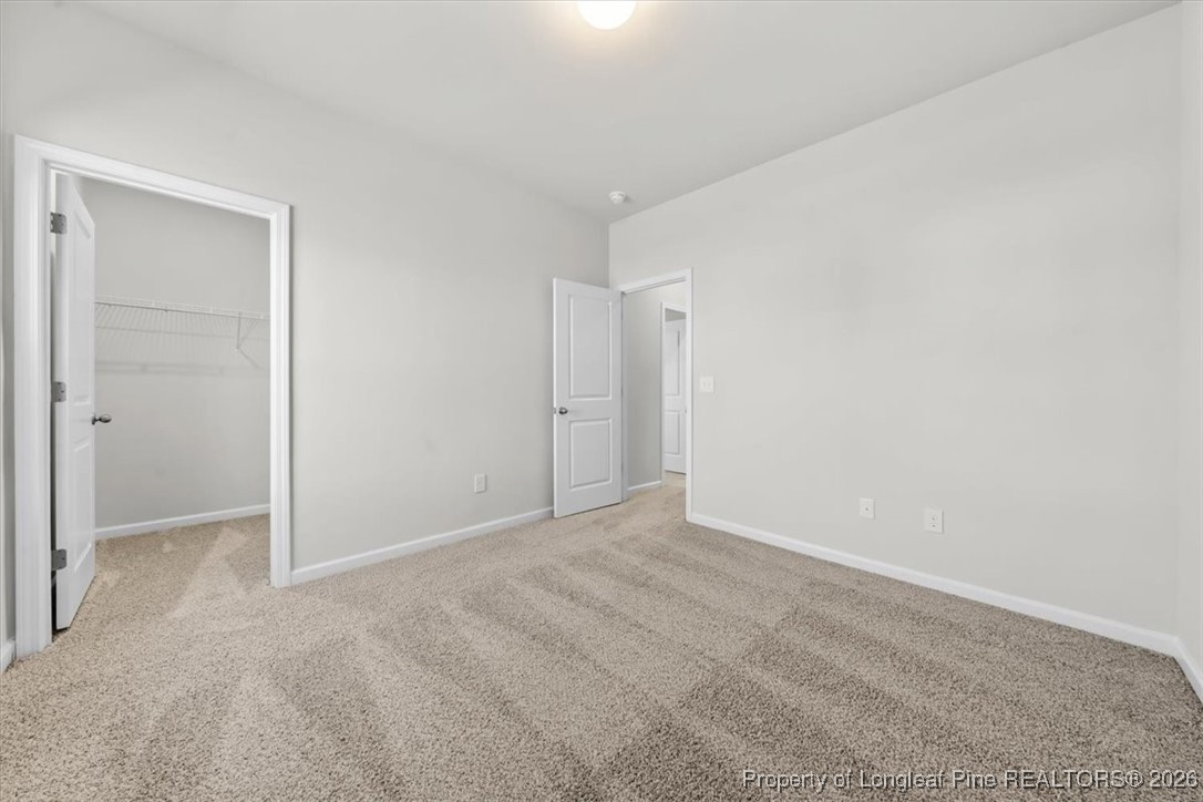266 Happy Trail Road Aberdeen, NC 28315 - Photo 23 of 34 a view of an empty room
