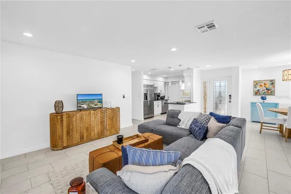 a living room with furniture and a couch