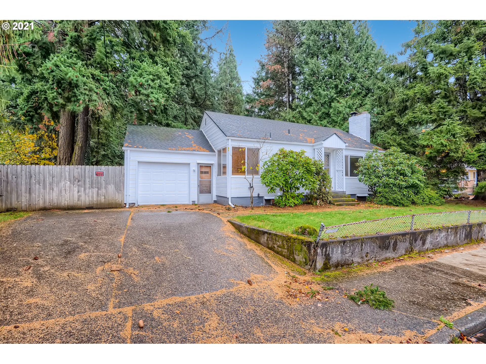 12044 Southeast Foster Road Portland, OR 97266 - Photo 1 of 28 a view of a house with a yard