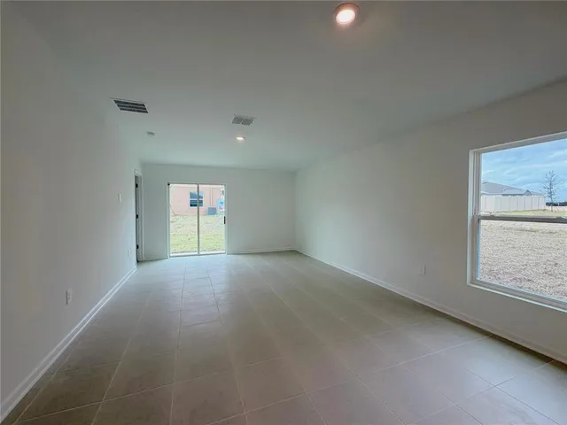 a view of empty room with window